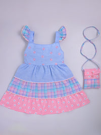 The Pastel Bloom Frock & Hat by Hopebow — blue and pink tiered cotton baby girl frock with pom-pom trim and coordinating bucket hat, full view