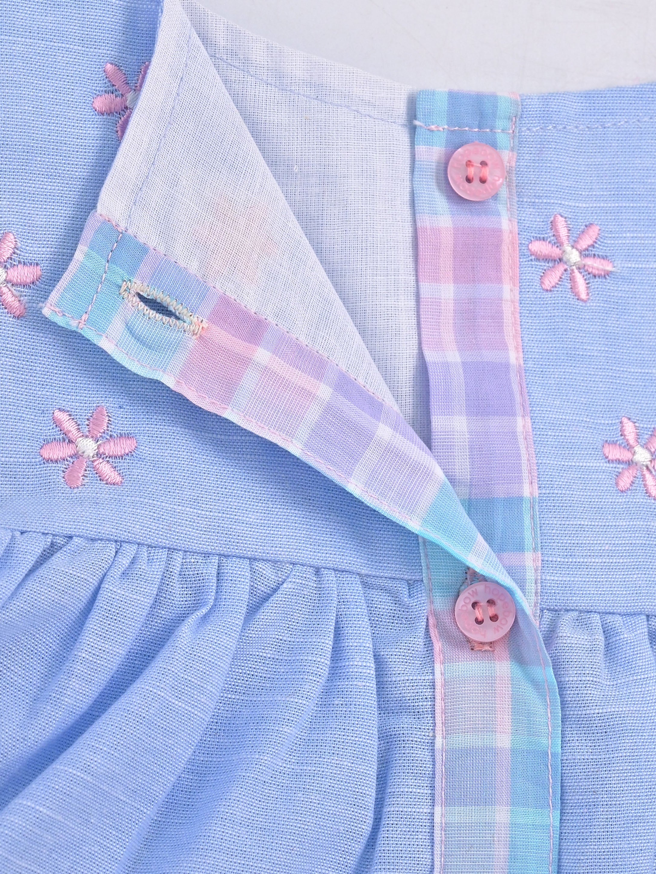 Hopebow Pastel Bloom frock — smocked bodice and floral embroidery detail