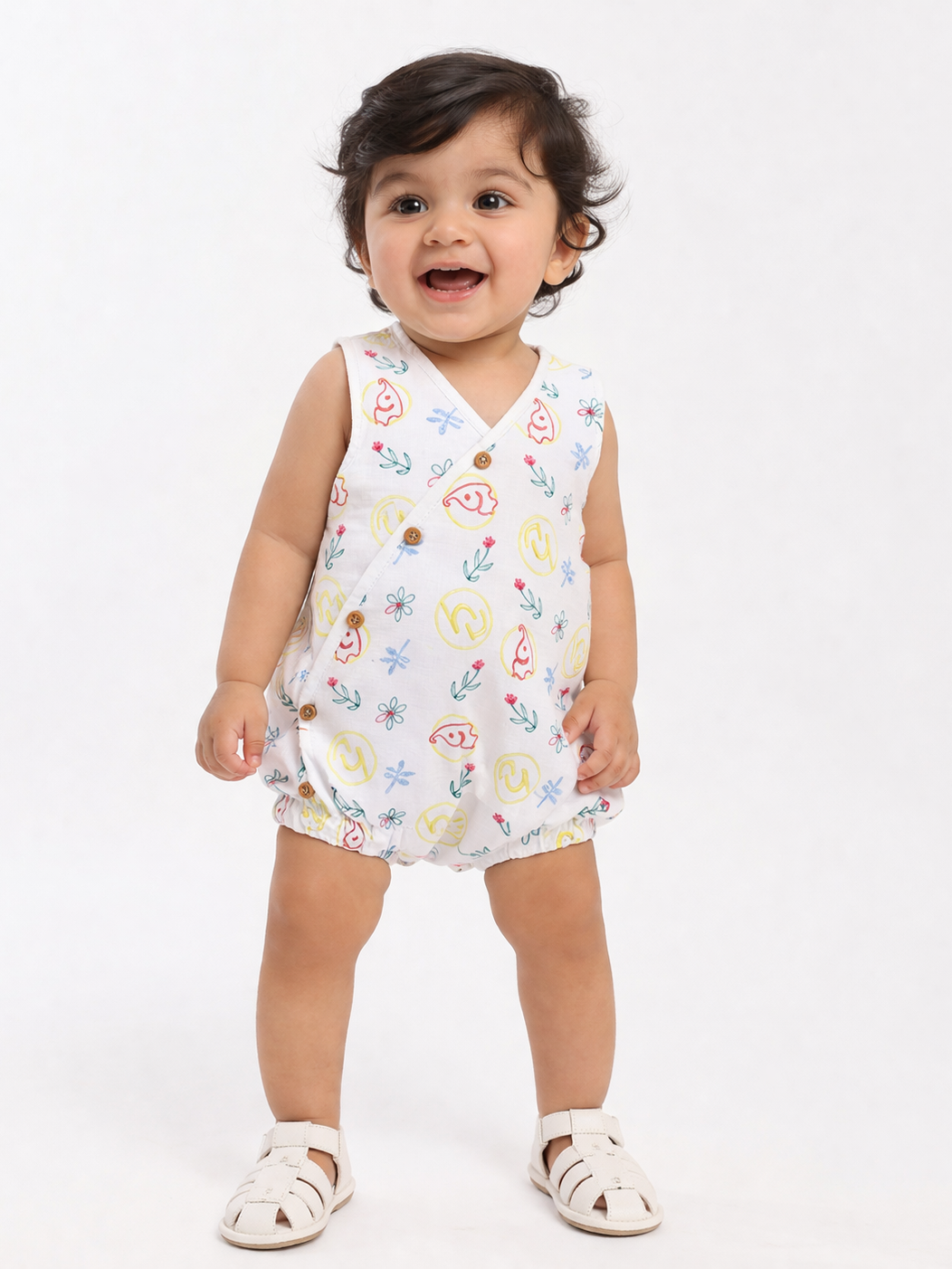 Hopebow Little Meadow ivory cotton baby romper with bib front