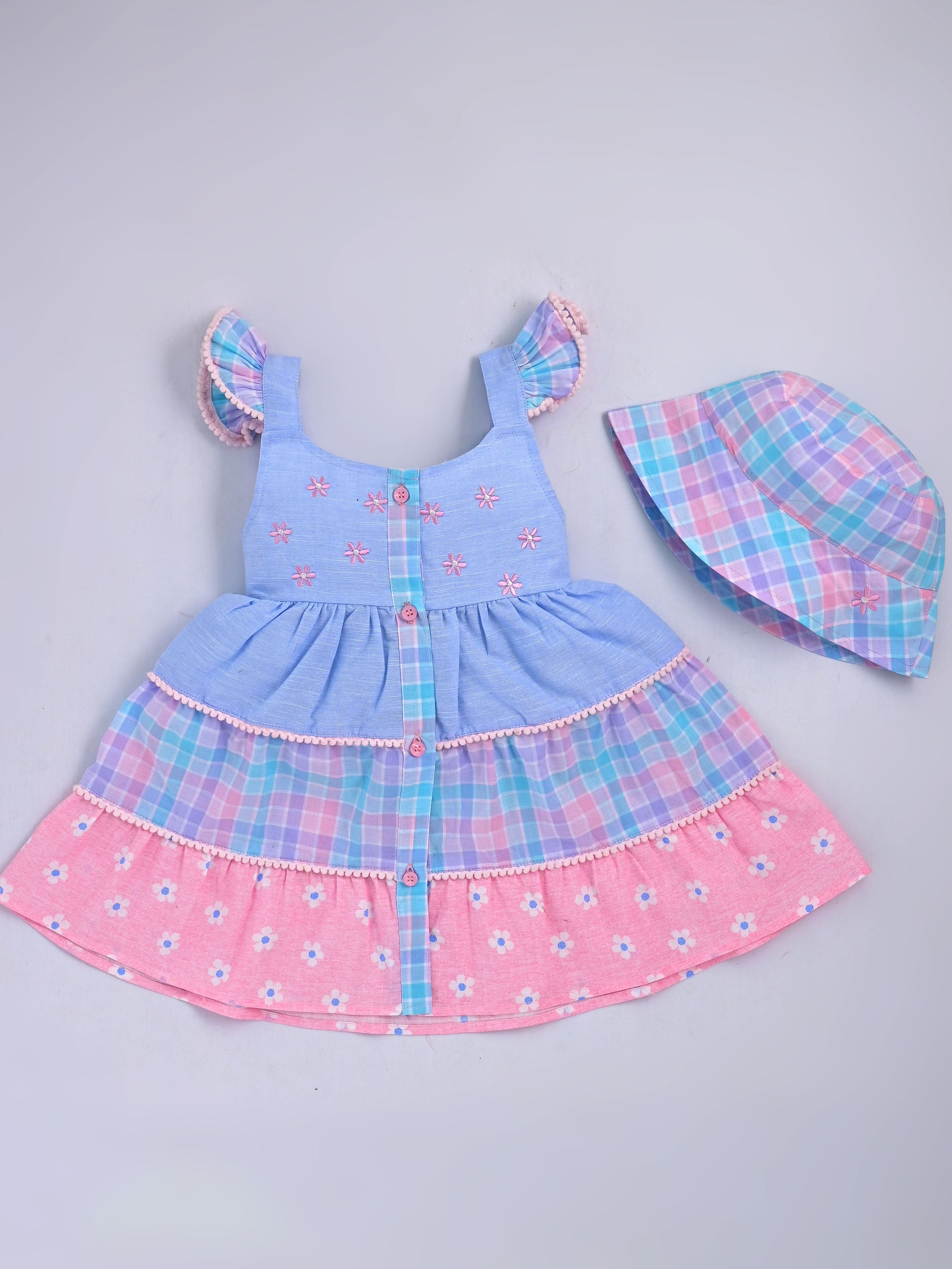 Hopebow Pastel Bloom baby girl frock with sling bag — flat lay