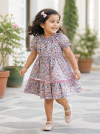 Hopebow tiered cotton dress with puff sleeves and garden floral