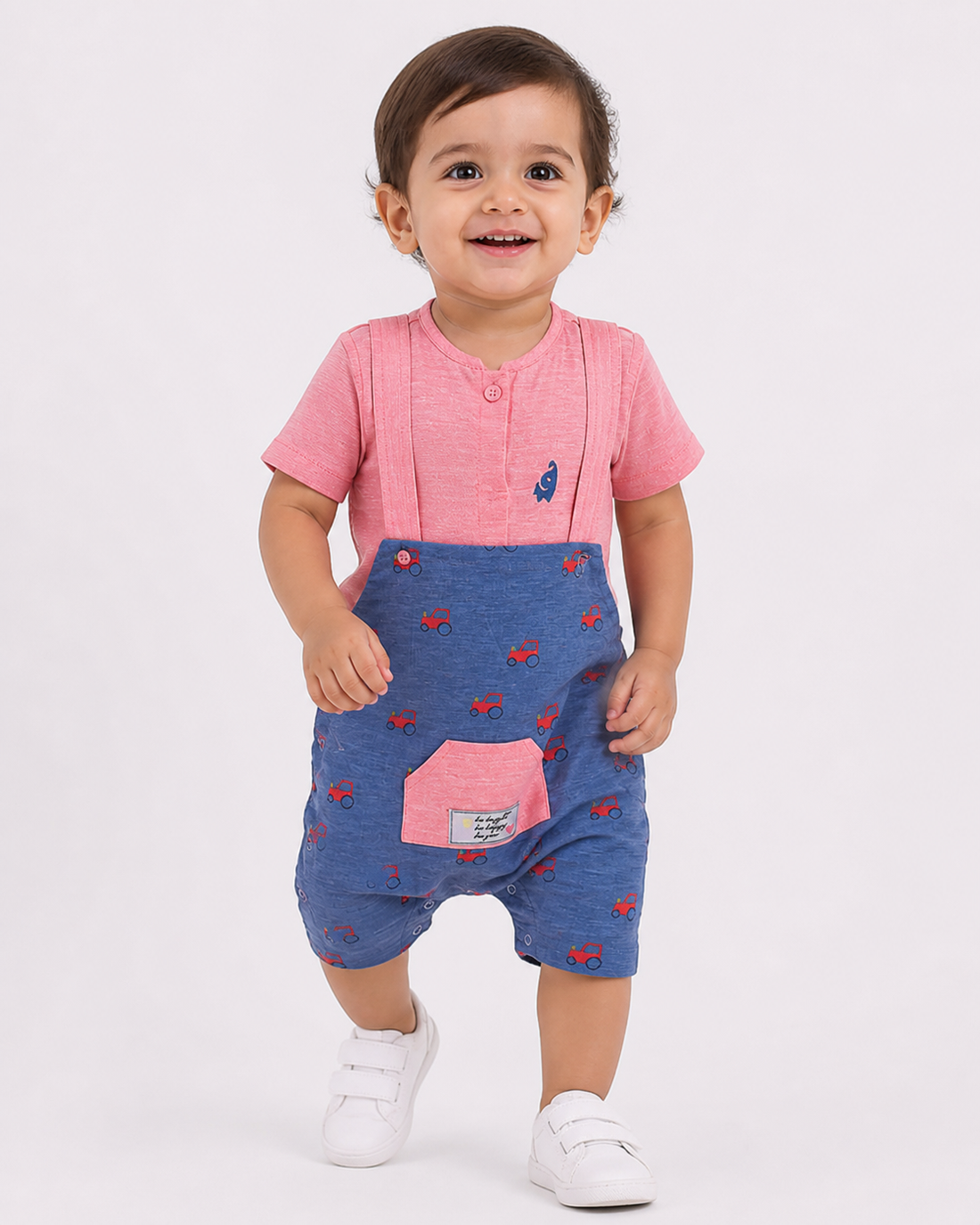 Premium baby boy romper in pink and blue with vehicle print
