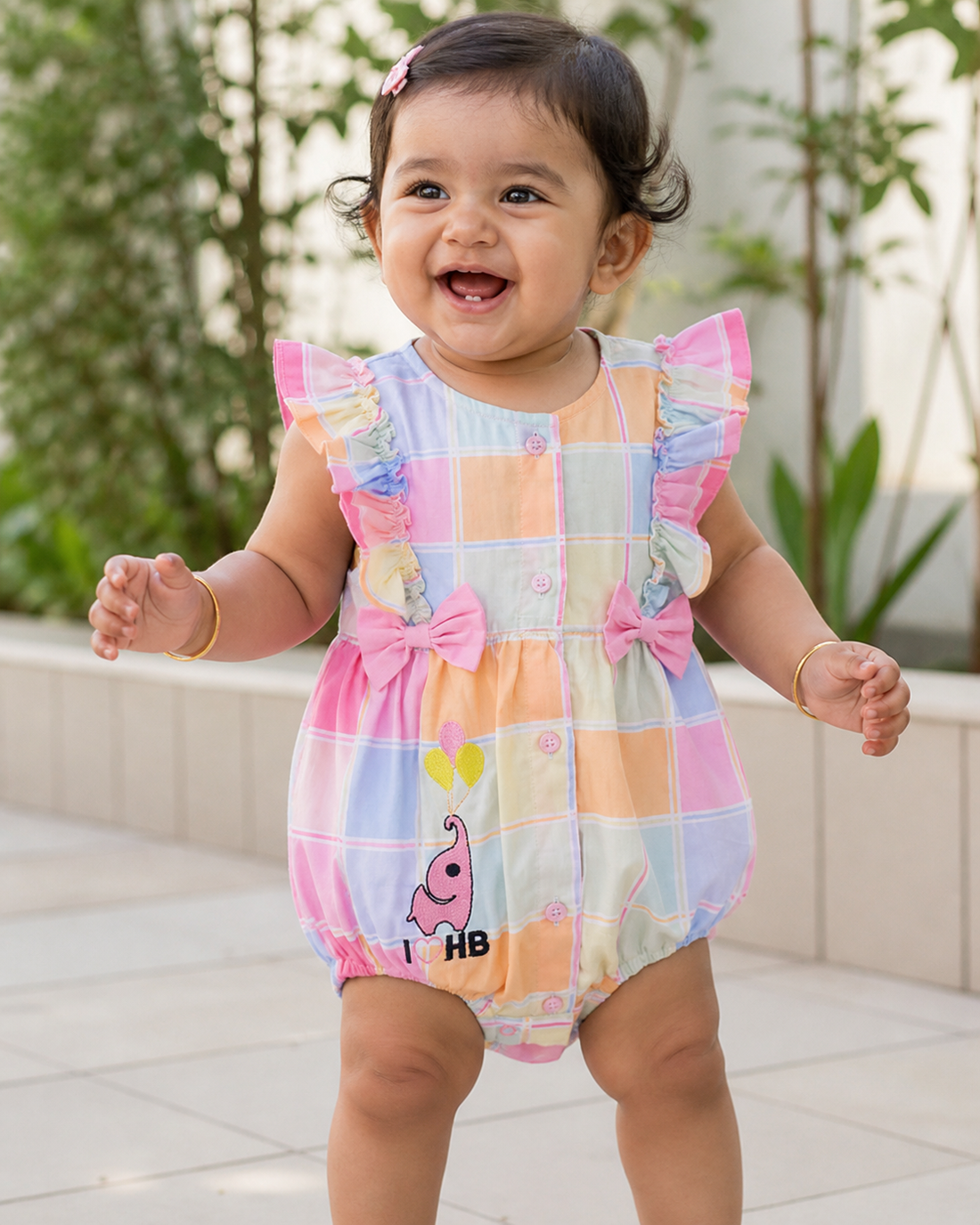 Hopebow Pastel Patch Bow baby girl romper with ruffle shoulders