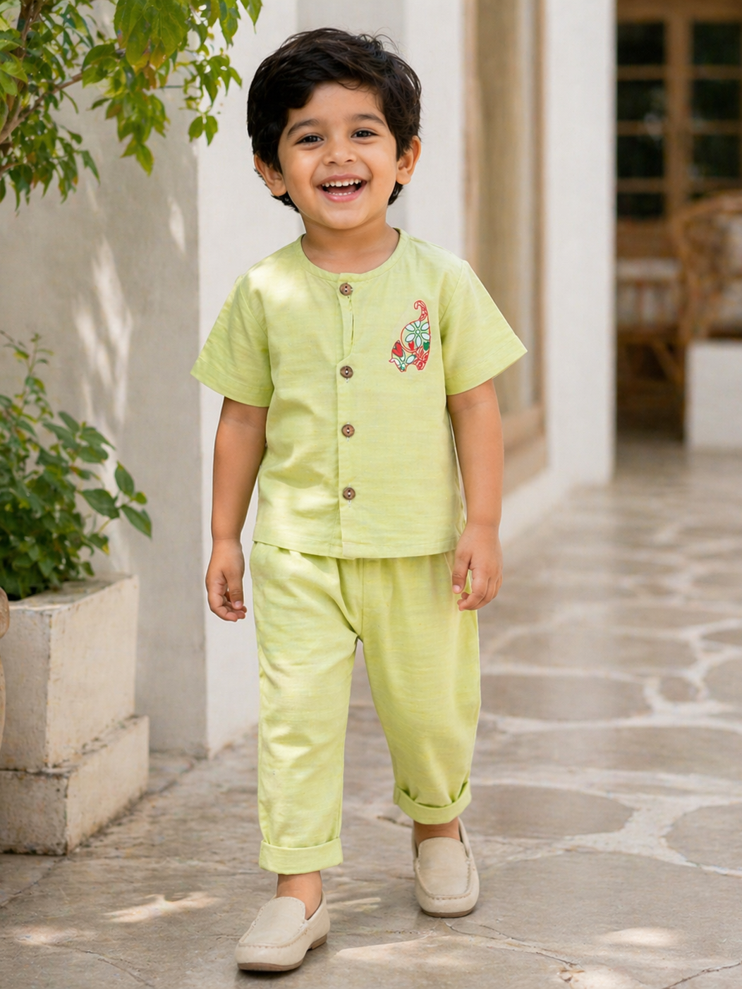 Boy wearing Hopebow pastel green cotton co-ord set