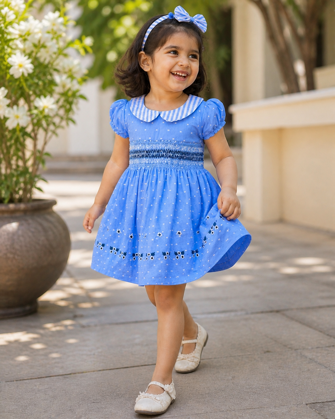 Hopebow Celeste Smocked blue cotton dress with Peter Pan collar