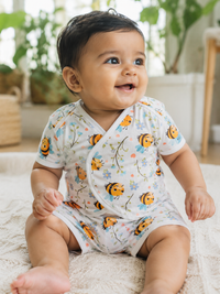 Baby wearing Hopebow bee and bloom print co-ord