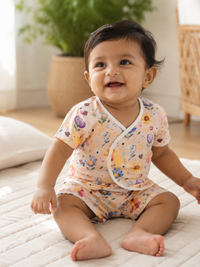 Baby wearing Hopebow garden bloom peach co-ord
